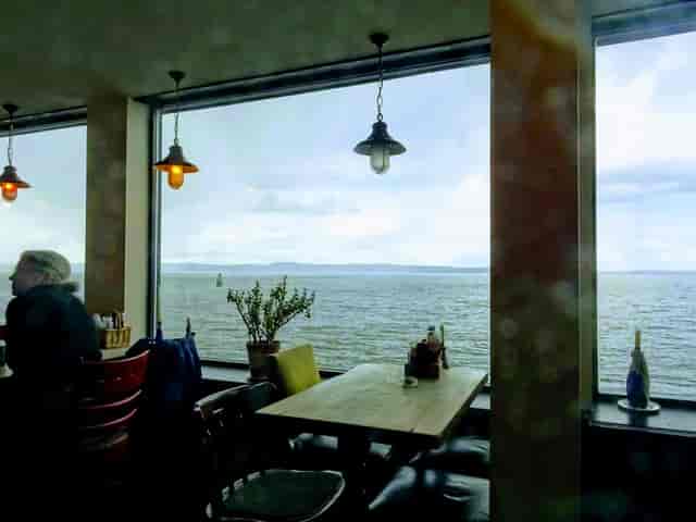 Waterfront breakout space at Old Chain Pier for intimate networking and strategy sessions.