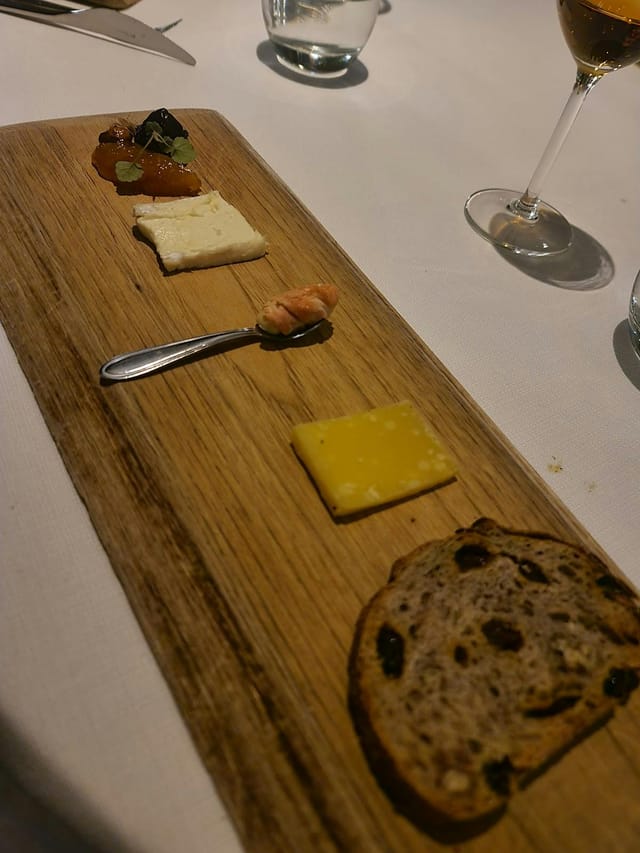 Minimalist plated starter at De Harmonie convention center, VIP dinner networking event.