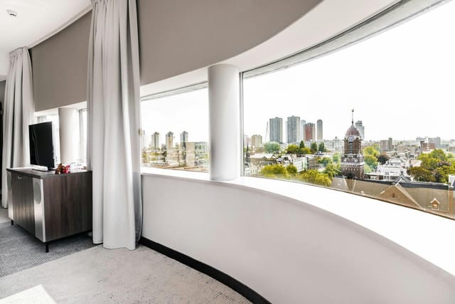 Bilderberg Parkhotel Rotterdam executive suite with city view for business meetings and VIP events.