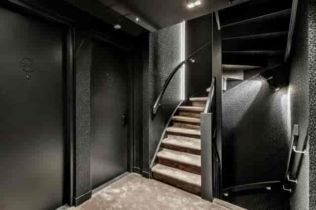 Moody Le Marin Hotel Rotterdam corridor with textured walls, ideal for boutique event guest blocks.