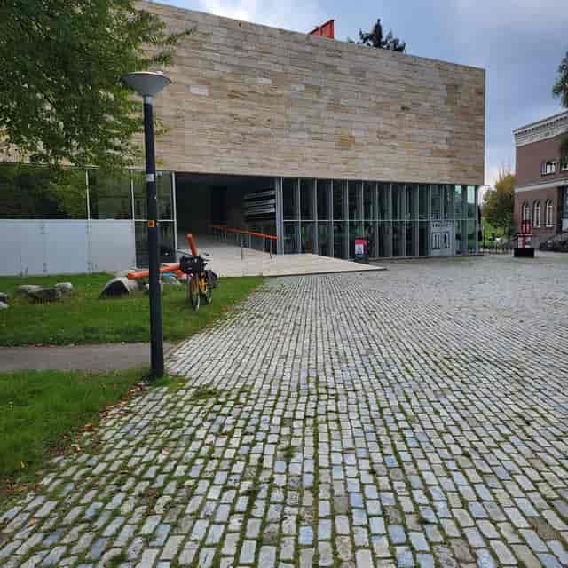 Modern Kunsthal Rotterdam auditorium featuring accessible ramp design for event venue hire.