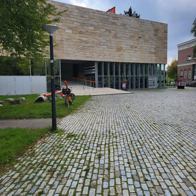 Modern Kunsthal Rotterdam auditorium featuring accessible ramp design for event venue hire.