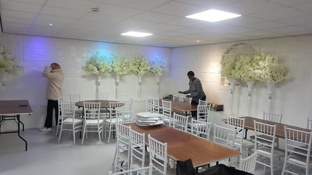 Diamond Plaza event hall with floral installations, ideal for weddings and corporate galas.