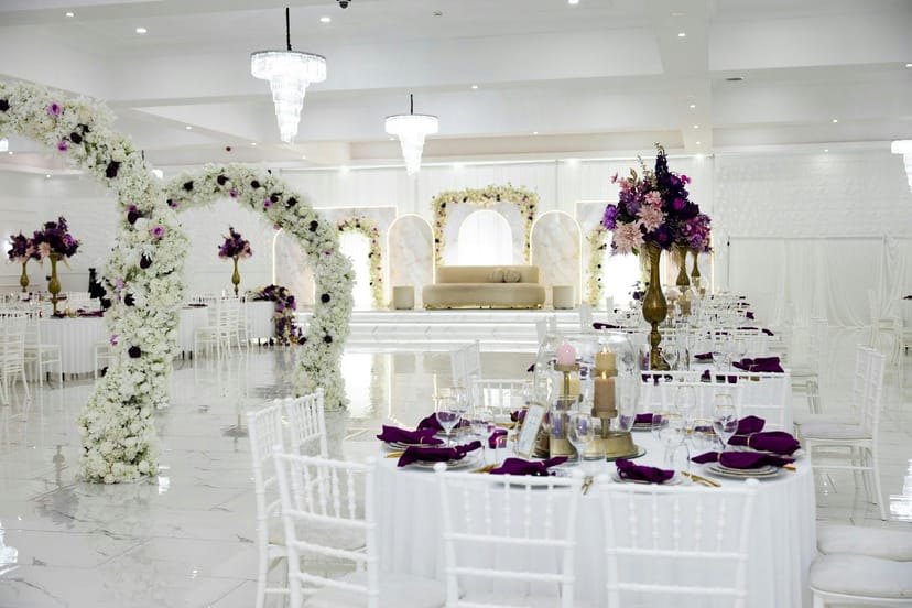 Luxury wedding reception with arched floral decor at Diamond Plaza for elegant event planning.