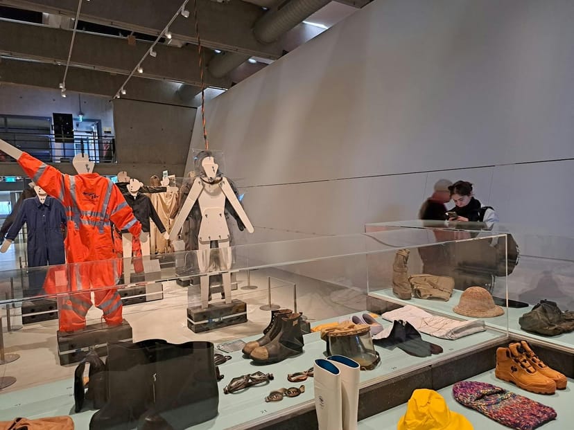 Nieuwe Instituut auditorium: minimal museum exhibit with integrated vitrines for event design.