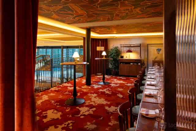 The Balcony in Marceline: Split-layout breakout space for corporate events and private dinners.