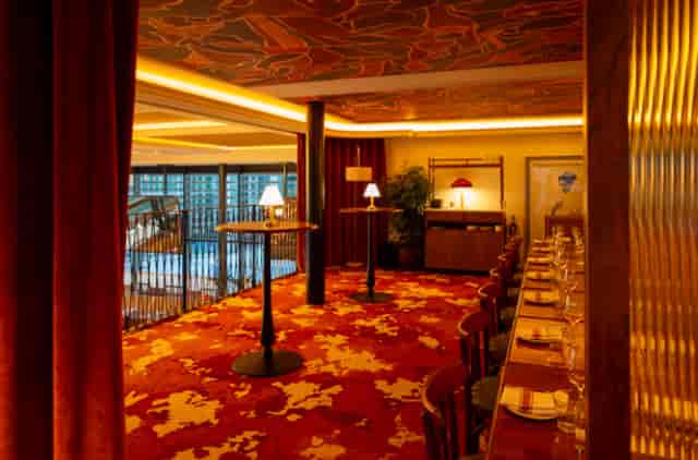 The Balcony in Marceline: upscale venue with ambient lighting for corporate dinners and networking.