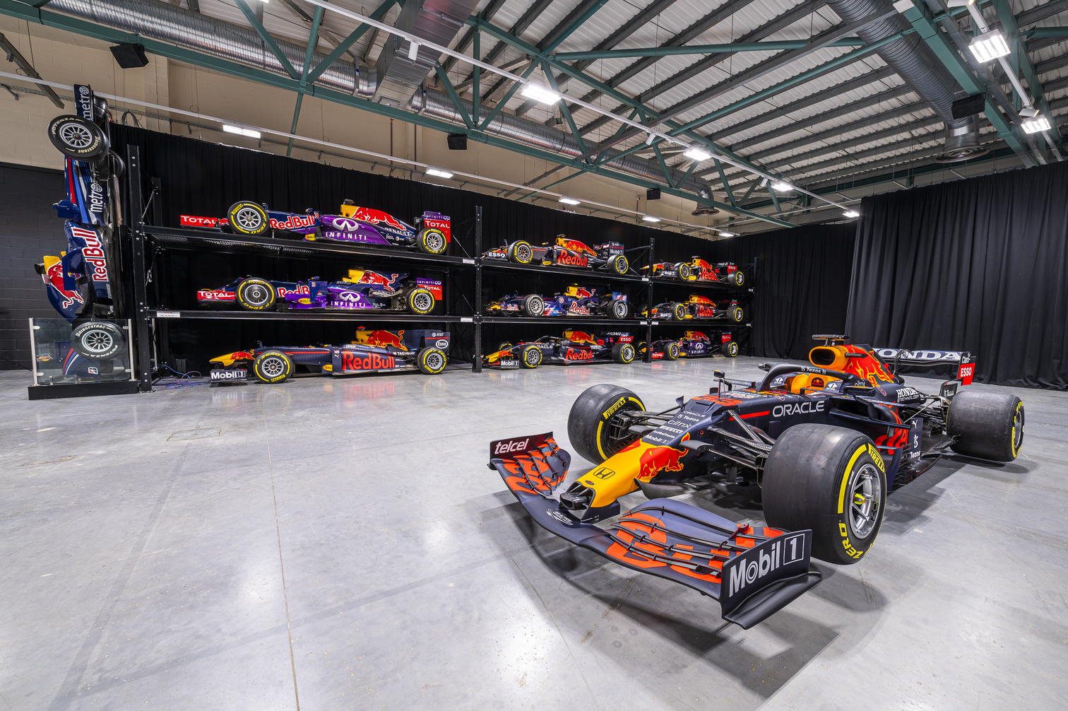 Sleek Formula 1 car at Red Bull Racing warehouse for corporate events and launches - Banner
