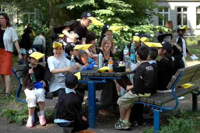 KinderKultur team-building: outdoor costumed activation for corporate event planning.
