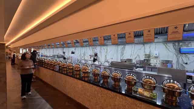 Royal Nawaab banquet hall with buffet setup for corporate events and conferences.
