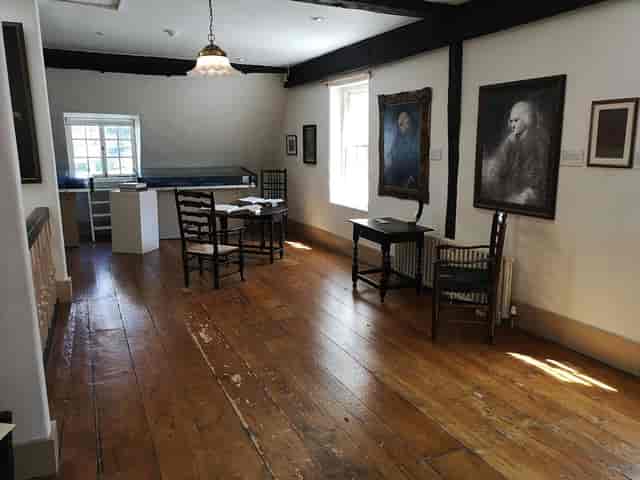 Garret room at Dr Johnson's House, intimate historic boardroom for private meetings and events.