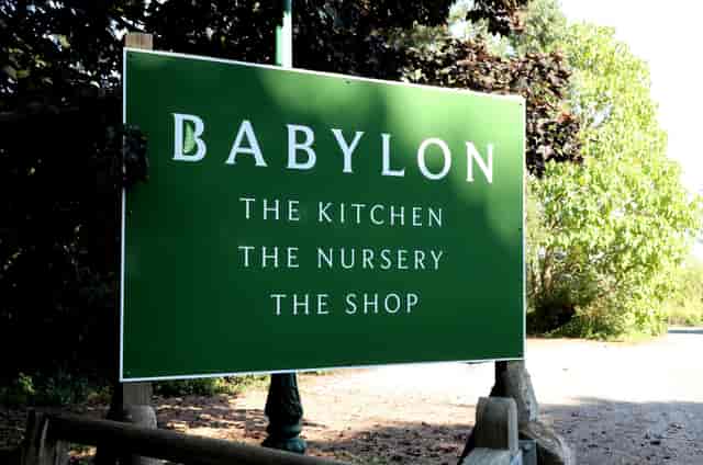 Rustic Babylon Garden Centre sign for farm-to-table boutique events and garden wedding catering.