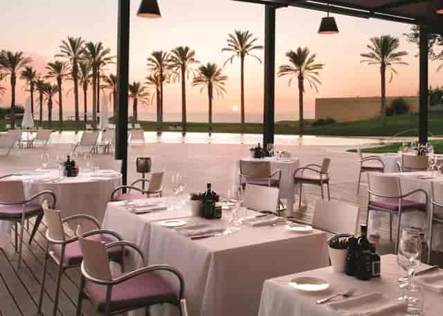 Verdura Resort ballroom: upscale sunset gala dinner venue with infinity pool terrace.