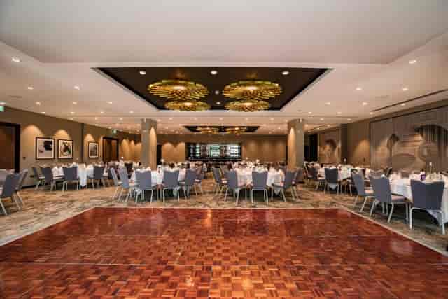 DoubleTree Woking banquet hall with wood dance floor, ideal for social dining and wedding events.