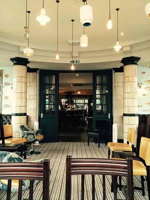 The Lounge at The Manor Arms: intimate networking breakout space with architectural character.
