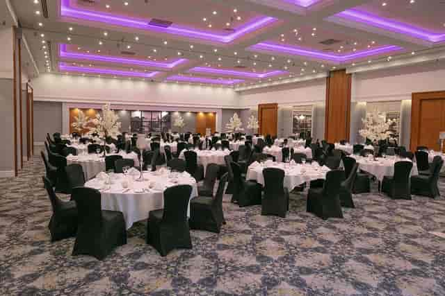 Chesford Grange ballroom with purple lighting, perfect for formal gala or corporate dinner events.