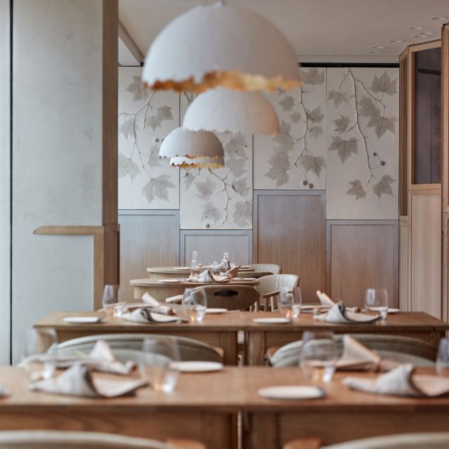 Stylish dining area in Hide Restaurant, perfect for private meetings or team-building events.
