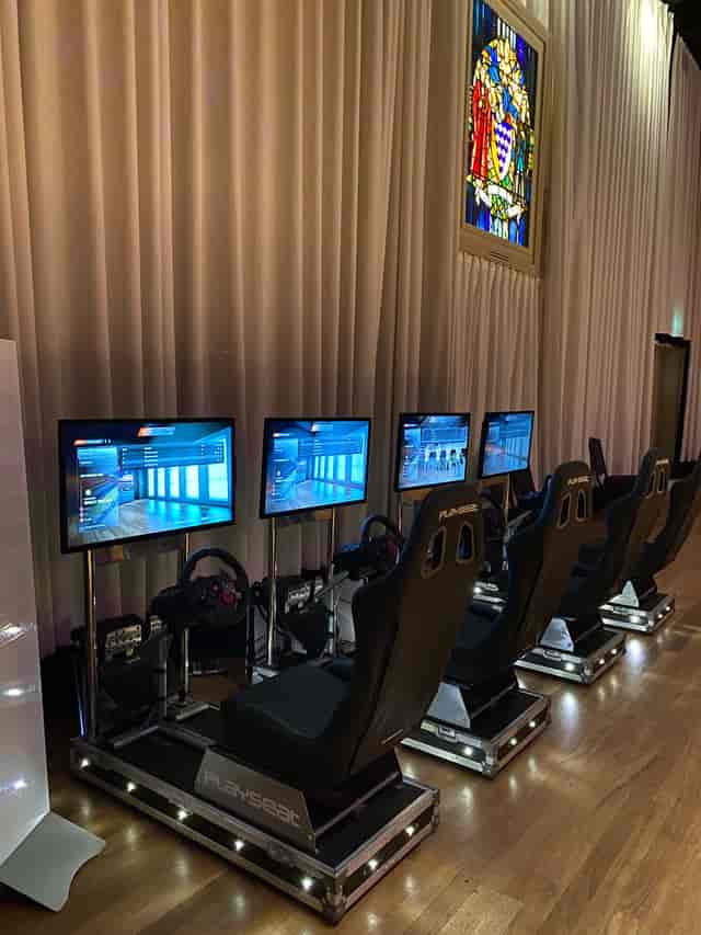 Modern gaming setup with racing simulators at Exclusive Venue Hire for corporate events.