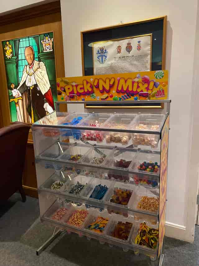 "Vibrant Pick 'N' Mix candy station at Glaziers Hall event venue"