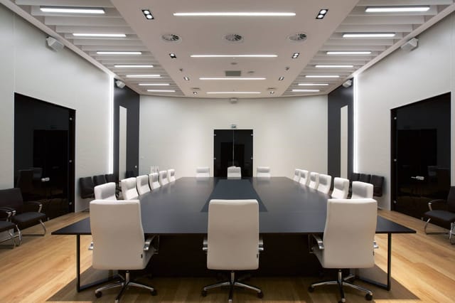 Minimalist boardroom at Cambridge Astana AIFC for executive strategy and high-stakes meetings.