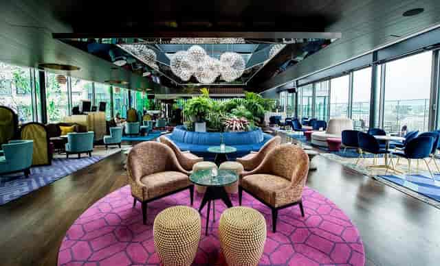 12th Knot venue in Sea Containers London: stylish space with vibrant colors for networking events.