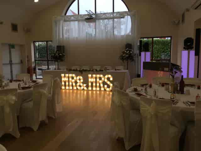 Sweetheart table with marquee letters at Snooker Hall wedding reception.