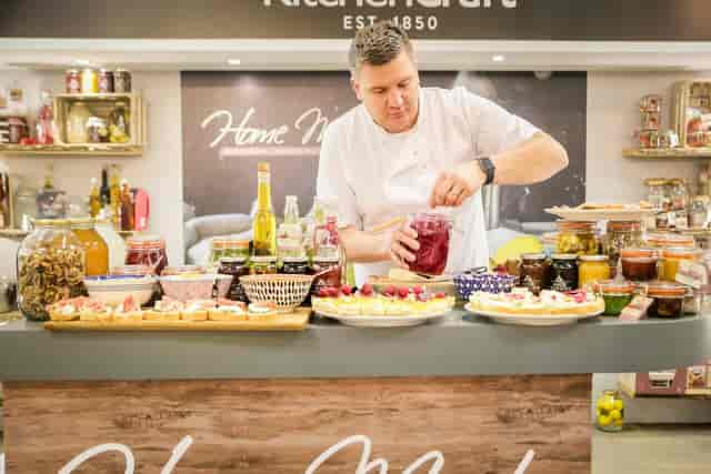Chef-led live demo in The Gallery Suite at Cranmore Park for F&B trade show corporate hospitality.