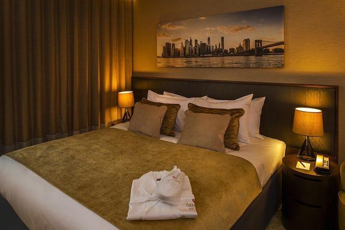 Upscale Genting Hotel guest room for VIP conference accommodation and event lodging.