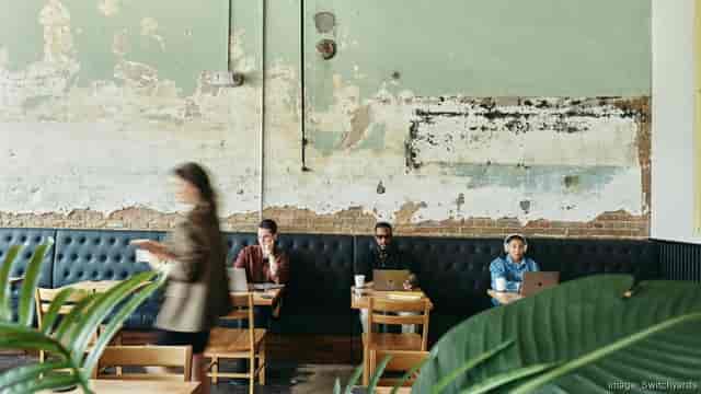 Modern industrial co-working meeting room for remote work and business events.
