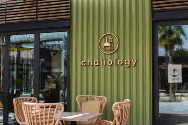 Chaiiology restaurant with rustic outdoor seating for informal networking and event venue spaces.