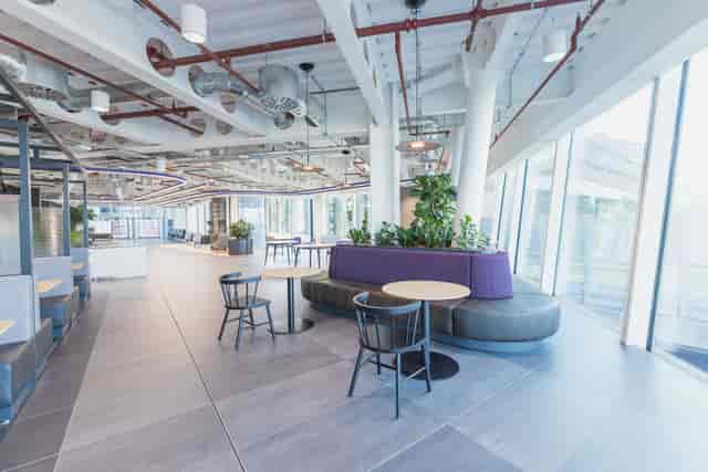 Light-filled Three Snowhill breakout room for business networking and corporate brainstorming.