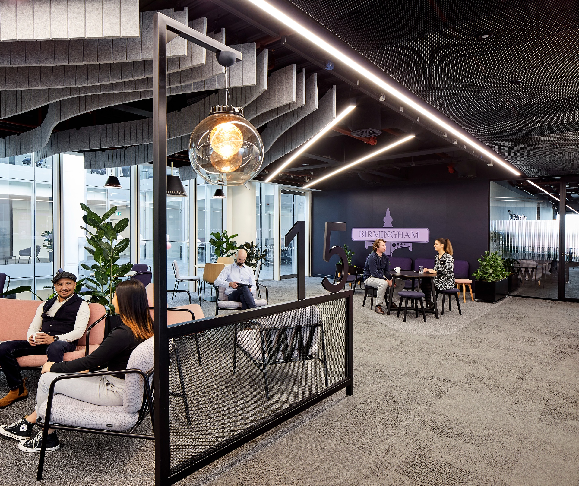 Modern corporate breakout space for flexible collaboration and office event planning. - Banner