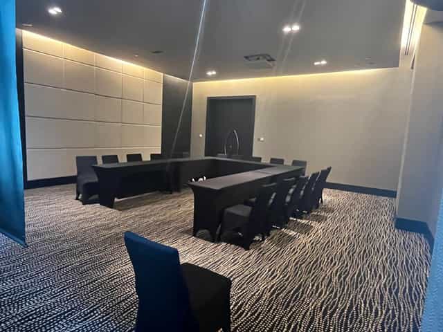 Sofitel Abu Dhabi Marble Room: modern meeting space for corporate events with sleek furnishings.