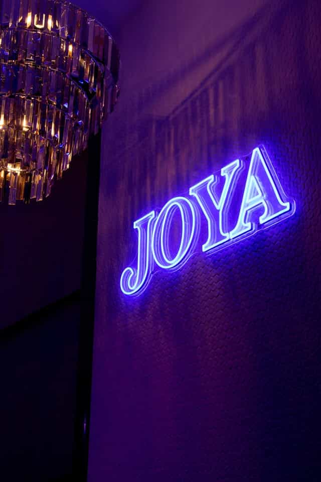 JOYA restaurant neon sign for social media photo booth event and brand activation.