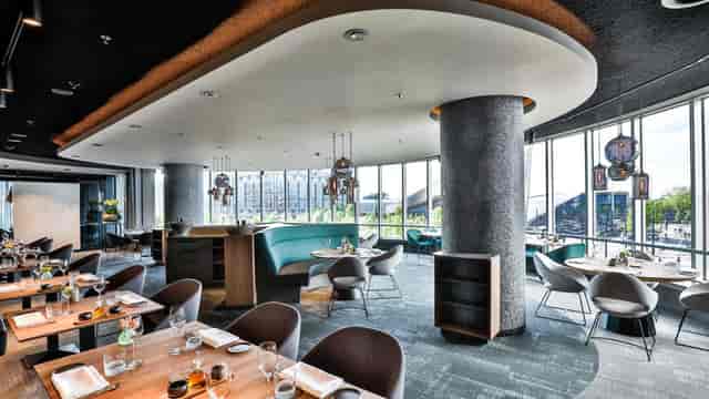 Modern luxury restaurant venue for corporate dinners and VIP networking events.