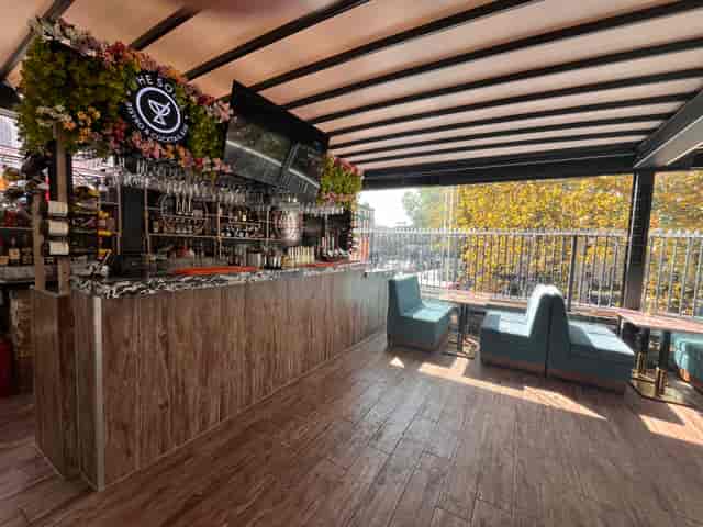 Roof terrace bar in The Solo, stylish seating for networking and events.
