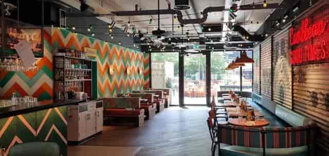 Private upstairs seating area at Turtle Bay Hammersmith, perfect for meetings and events.