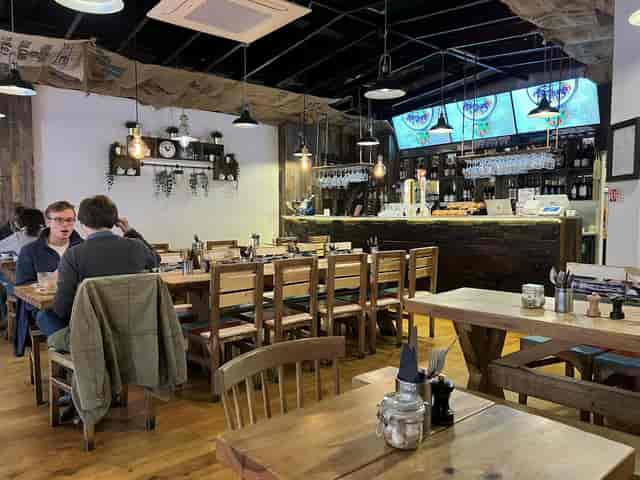 Rustic-industrial Oxford brunch bar for corporate team lunches and networking events.