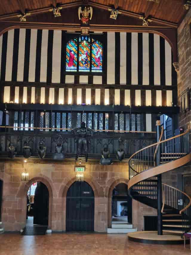 St Mary's Guildhall Great Hall with historic armor, perfect for themed galas and VIP receptions.