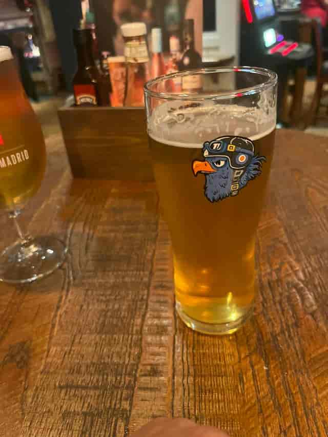 Branded glassware at an Old Hare and Hounds networking event for corporate hospitality.