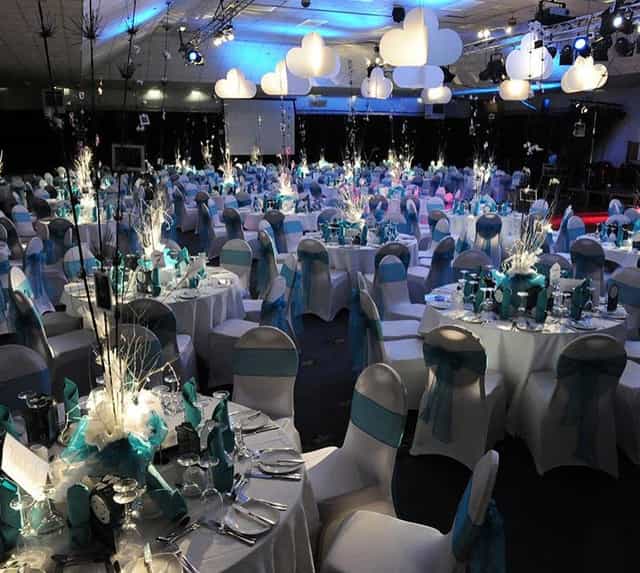 Ringside Suite, Wolverhampton Racecourse: Banquet-style gala event setup with formal chair covers.