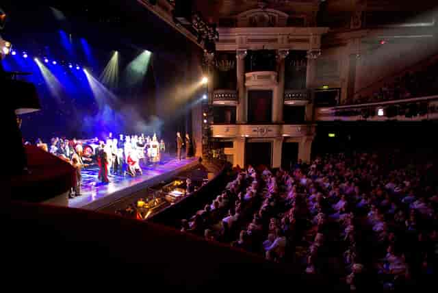 Birmingham Hippodrome theater live performance with stunning stage design and vibrant lighting.