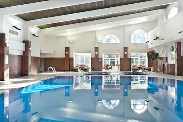 Elegant indoor pool at The Belfry spa, perfect for upscale events and retreats.
