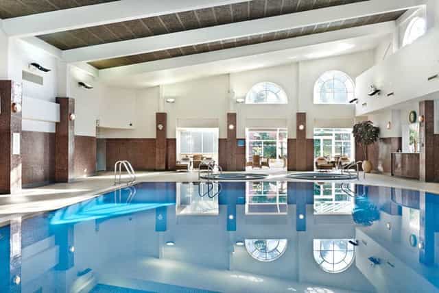 Elegant indoor pool at The Belfry spa, perfect for upscale events and retreats.