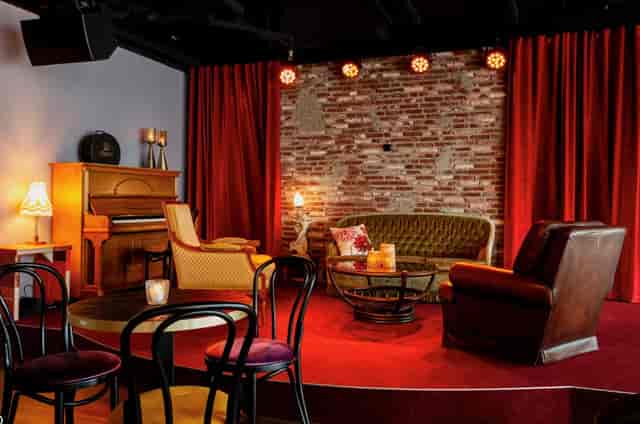 Café Dox lounge with vintage decor for intimate performances and networking events.