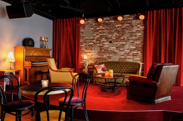 Café Dox lounge with vintage decor for intimate performances and networking events.