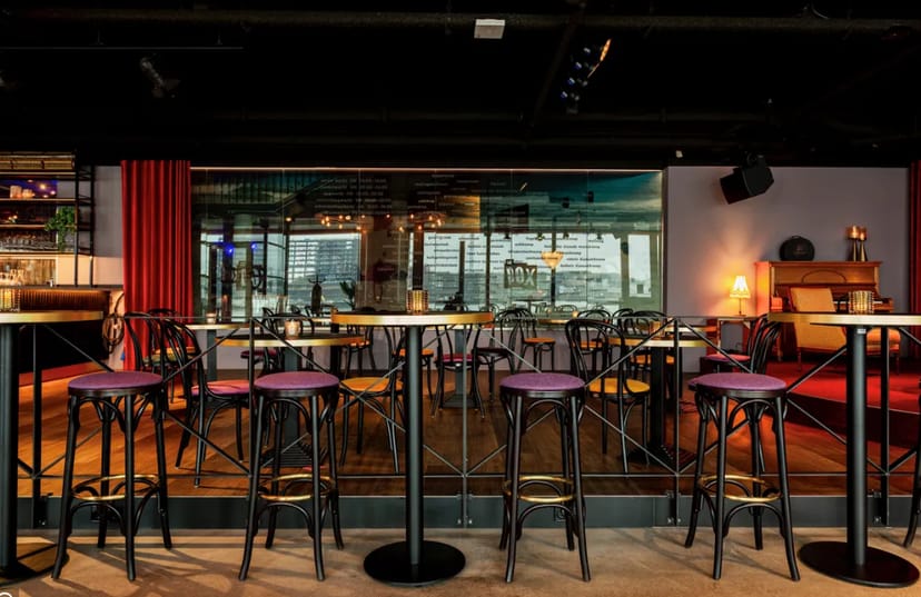 Café Dox lounge setup for networking mixers and corporate receptions at New Luxor Theater.
