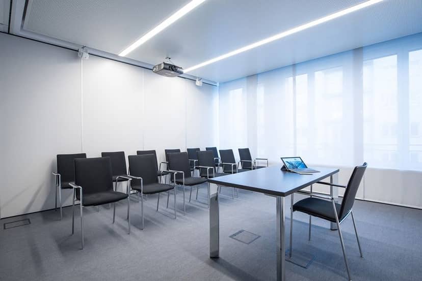 Minimalist boardroom setup for corporate meetings and executive presentations at hbw center.