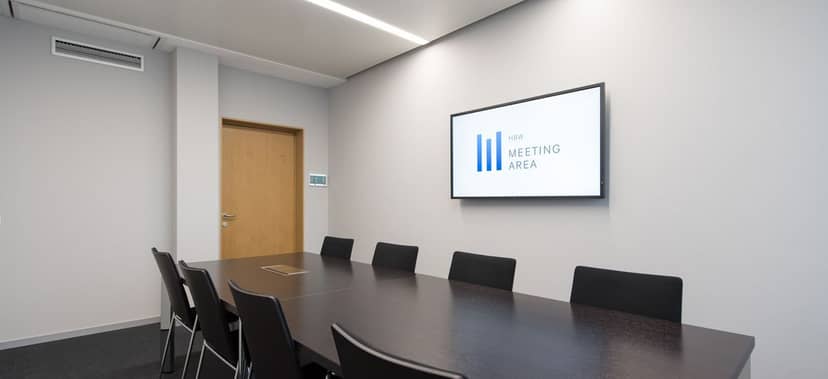 Minimalist boardroom at hbw ConferenceCenter for strategy sessions and executive interviews.