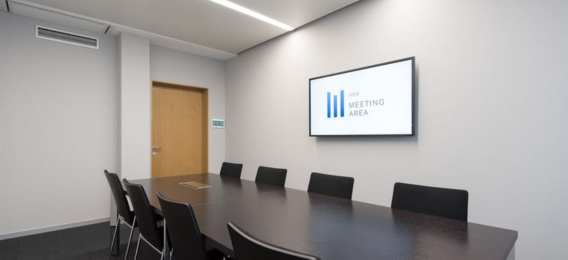 Minimalist boardroom at hbw ConferenceCenter for strategy sessions and executive interviews.